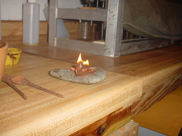 light the powder, let it flame to get the embers going