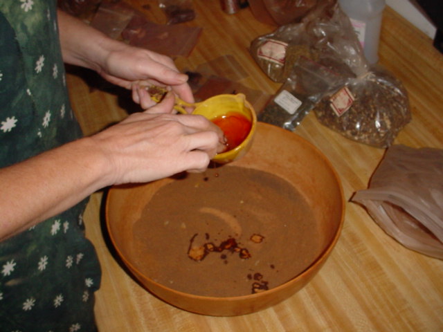 adding powder to the oil
